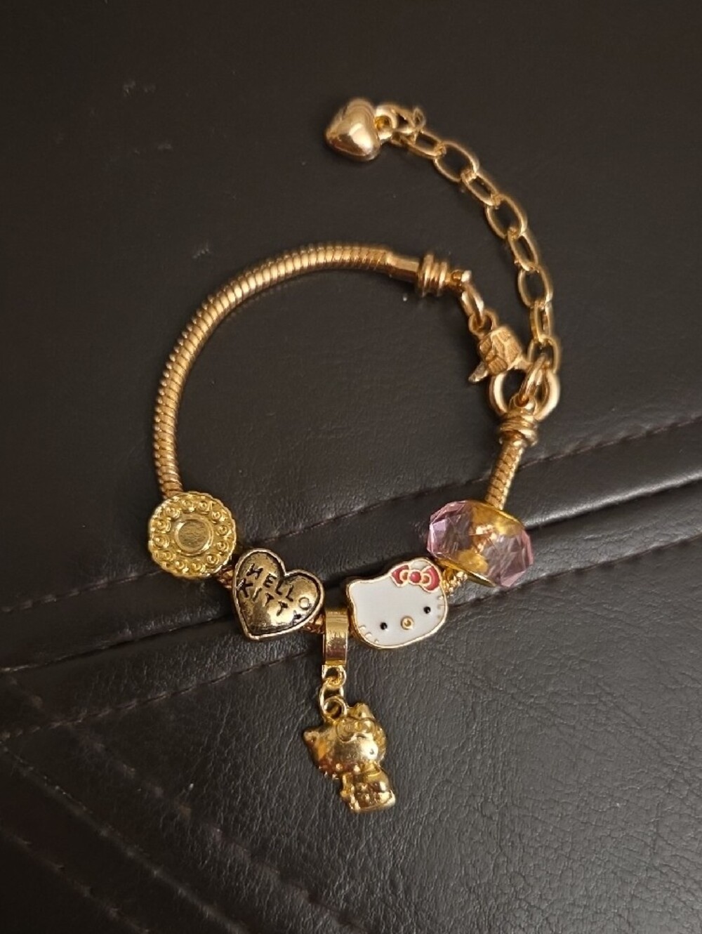 Gold Tone Hello Kitty Charm Bracelet with Pink Bead and White Cat Charm 7in